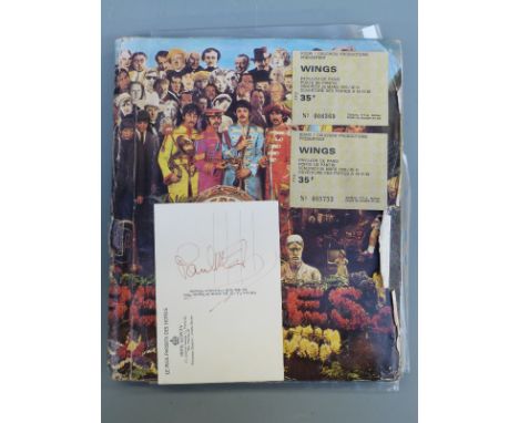 Paul McCartney signed postcard with a collection of Wings and Paul McCartney ephemera, including candid photos of the McCartn