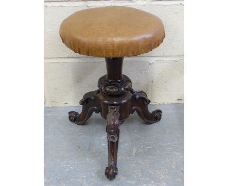 An adjustable 19thC piano stool