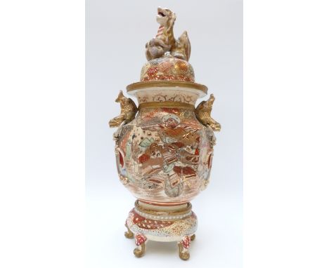 A Japanese Satsuma lidded vase with warrior decoration and Fo dog finial, 37cm tall