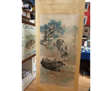 A Chinese scroll painting depicting buffalo, signed with seal mark