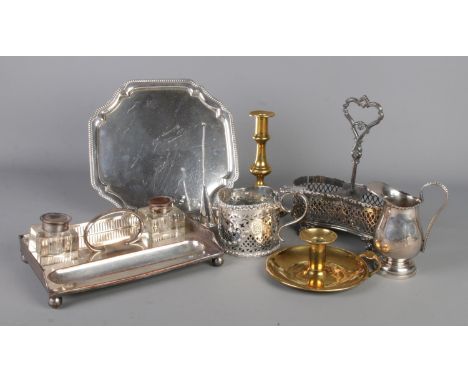 A good collection of metalwares. Includes silver plate on copper desk stand, chamber sticks, brass candlestick etc.