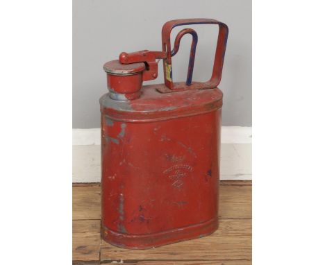 A vintage American red safety fuel can from Protectoseal Co. Chicago in 1950s, with model number "883A".