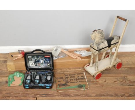 A quantity of vintage toys including a boxed Pro Shot Gold by Marx together with a scratch built push along toy horse, Old Nu