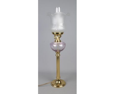 An electric table lamp in the form of an oil lamp. Featuring Corinthian column and frosted glass shade. Height: 71cm