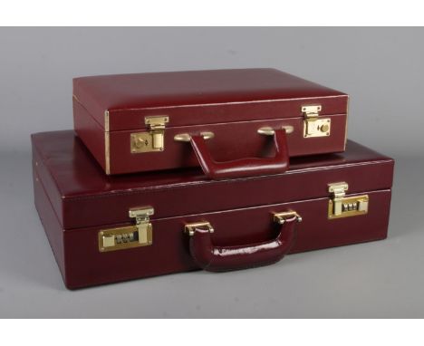 A Franzen leather briefcase along with a similar smaller example.