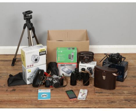 A quantity of mainly photographic equipment. To include Praktica Super TL, boxed Panasonic FZ28, Star 61 tripod, `a cased pai
