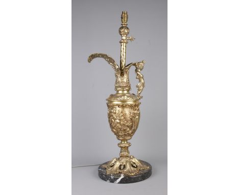 A Renaissance style gilt metal ewer lamp raised on circular marble base. With figural Height 74cm.