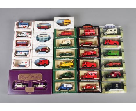 A collection of boxed scale model vehicles, produced by Lledo. To include YTV Heartbeat, London's Burning and 'The Spirit of 