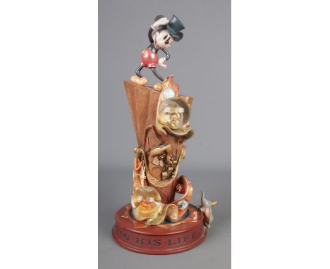Disney Mickey Mouse 100th year celebrating his life and legacy snow globe in original box.