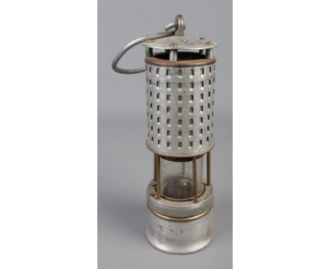 A Koehler No.20 A American miners safety lamp with pierced hood and swing handle.