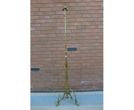 An Arts and Crafts brass telescopic floor standing down lighter, manner of W.A.S. Benson 