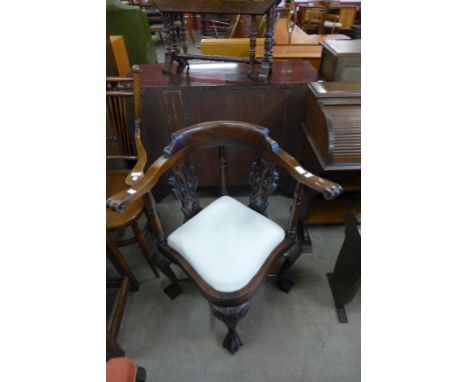 A Chippendale Revival carved mahogany corner chair 