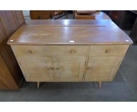 An Ercol Blonde elm and beech 351 model sideboard 
