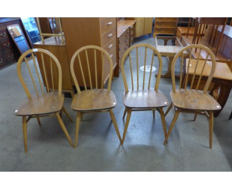 A set of four Ercol Blonde elm and beech Windsor chairs 