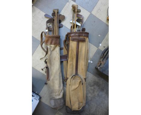 Two vintage golf bags with assorted golf clubs, including hickory shafted