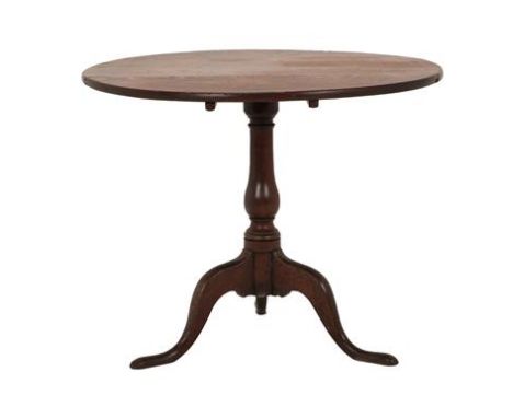 ^ A George III Oak Tripod Table, 3rd quarter 18th century, the flip-top above a turned vasiform support with three cabriole l