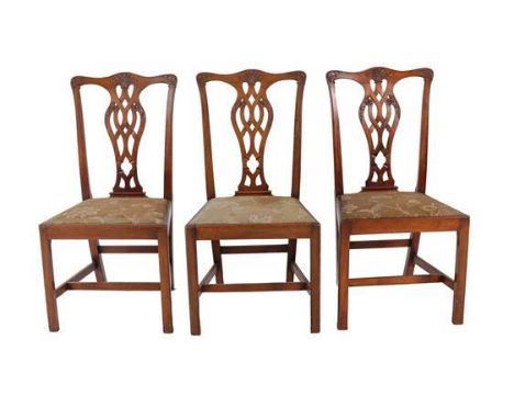 A Set of Six Chippendale Revival Mahogany Dining Chairs, circa 1900, with acanthus carved top rails and pierced splats above 