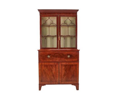 A Mid 19th Century Mahogany and Parquetry-Banded Secretaire Bookcase, the moulded cornice above lancet glazed doors enclosing