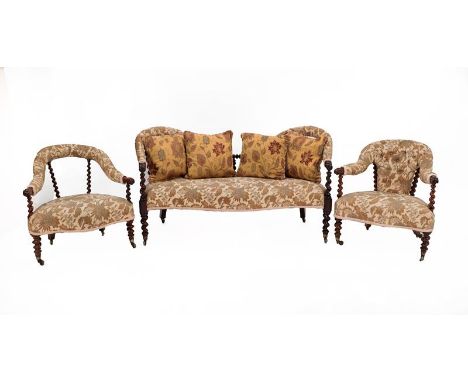 A Victorian Rosewood and Spiral Turned Three Piece Suite, circa 1880, recovered in floral cut fabric, comprising a three-seat