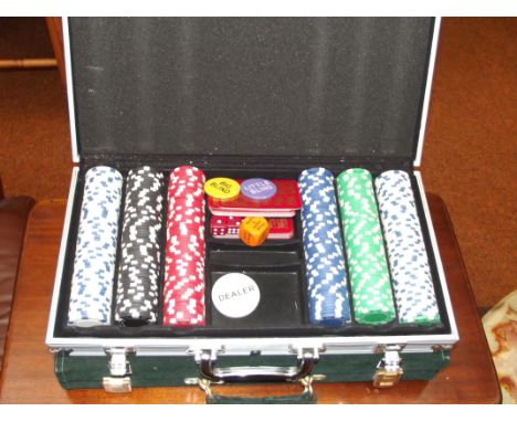 Cased backgammon set together with a cased poker set