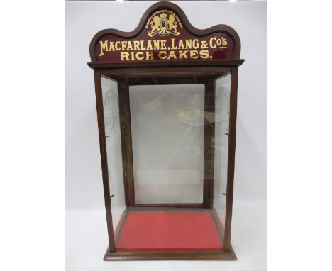 A Macfarlane, Lang &amp; Co's Rich Cakes  mahogany counter top dispensing cabinet with rear opening door etched glass sides a