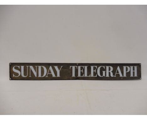 A Sunday Telegraph narrow enamel strip, 31 1/2 x 4". 