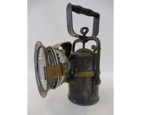 A Premier hand held lamp bearing brass trademark label plus filling line. 