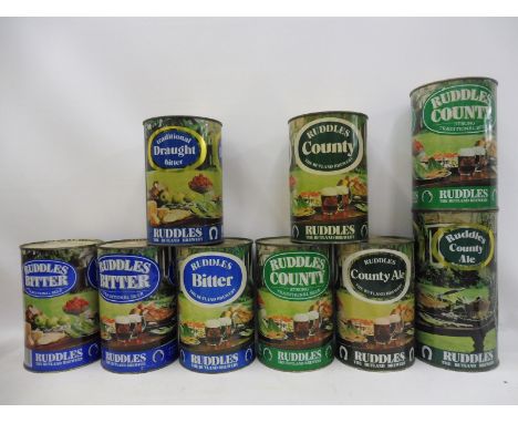 Nine large scale Ruddles beer cans. 