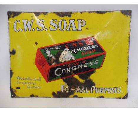 A C.W.S. Soap pictorial packet convex enamel sign, 21 1/4 x 15 1/2". 