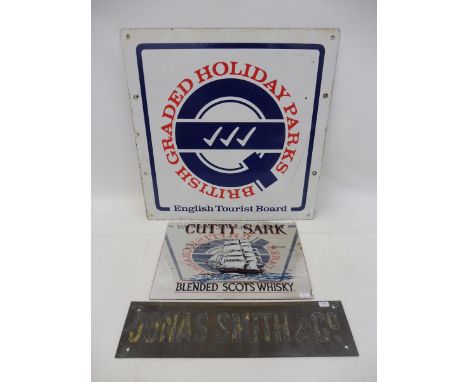 An English Tourist Board enamel sign for British Graded Holiday Parks plus a reproduction Cutty Sark Whisky advertising mirro