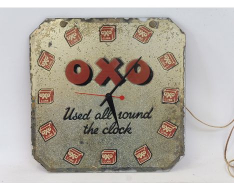 A rare Oxo glass advertising clock 'Used all round clock', 12 x 12".