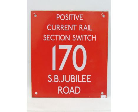 An Underground Railway enamel sign for attaching to a cabinet bearing the words 'Positive Current Rail Section Switch 170 S.B