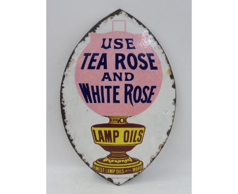 A rare Tea Rose and White Rose Lamp Oils pictorial oval enamel sign with a small amount of restoration, by Imperial, 11 x 17 