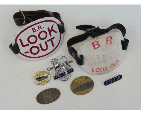 Two British Rail enamel armbands and a selection of railway badges and plaques.