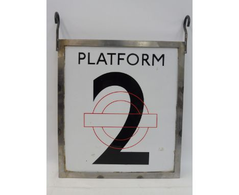 A 'Platform 2' Underground Railway station double sided enamel sign, set within a newly made frame, 16 3/4 x 21 1/2" overall.