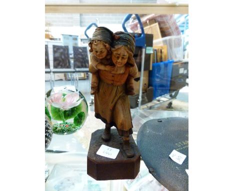 Dutch figurine in light wood depicting two girls