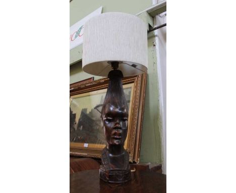 A carved African hardwood female figure head lamp with shade