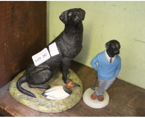 "Ready to Retrieve" porcelain model of a black lab and a Labrador golfer
