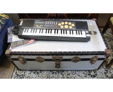 A silver finished traveling trunk