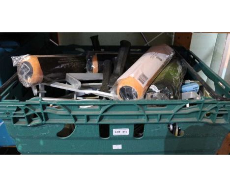 A crate of roller handles etc