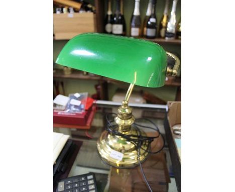 A Bankers type desk lamp, brass with a green glass shade