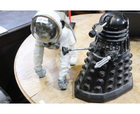 A black Dalek and the first monkey in space table top models