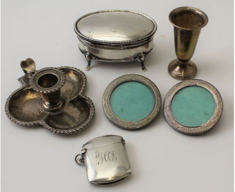 Stokes and Ireland Ltd, a silver chamberstick, trefoil base with heart thumbpiece, Birmingham 1892, 68g, together with a silv