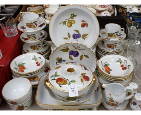 A Royal Worcester Evesham pattern part dinner and tea service, comprising cups, saucers, side plates, milk jug, sugar bowl, b