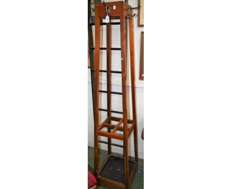 A mahogany coat/stick stand