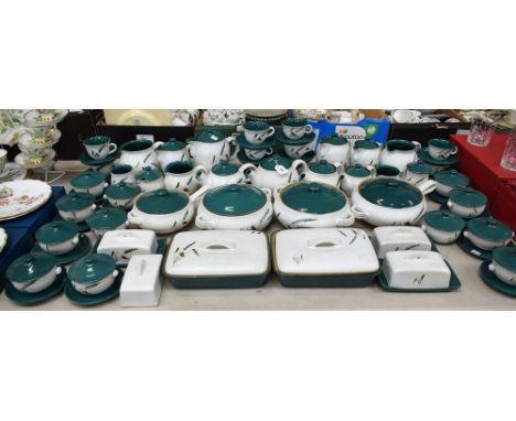 A Denby Greenwheat comprehensive dinner and tea service, including a pair of rectangular divided vegetable dishes, teapots, j