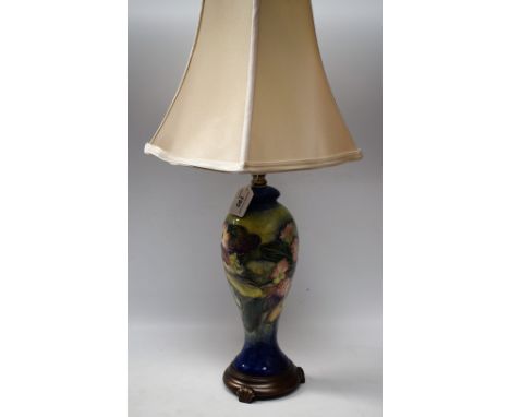 A Moorcroft Primrose pattern slender inverted baluster table lamp, tube lined with flowers in delicate shades of pink, green 