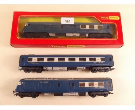A Triang Pullman R328 tractor unit, boxed and two coaches 