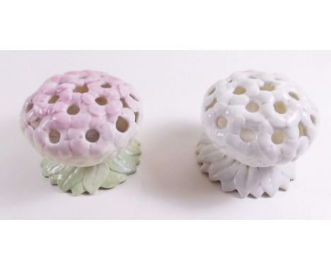 A Royal Worcester flower frog 1904 and a Graingers one