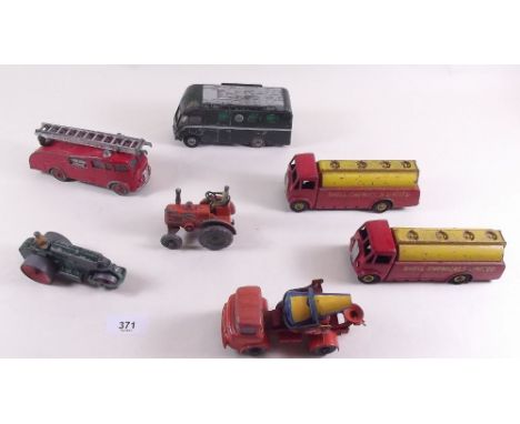 A collection of Dinky comprising: mobile control room No 967, two AEC Monarch shell tankers, fire engine No 955, concrete mix